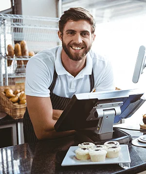 images/image_hovers/Term_loan_smiling-worker-posing-counter.png